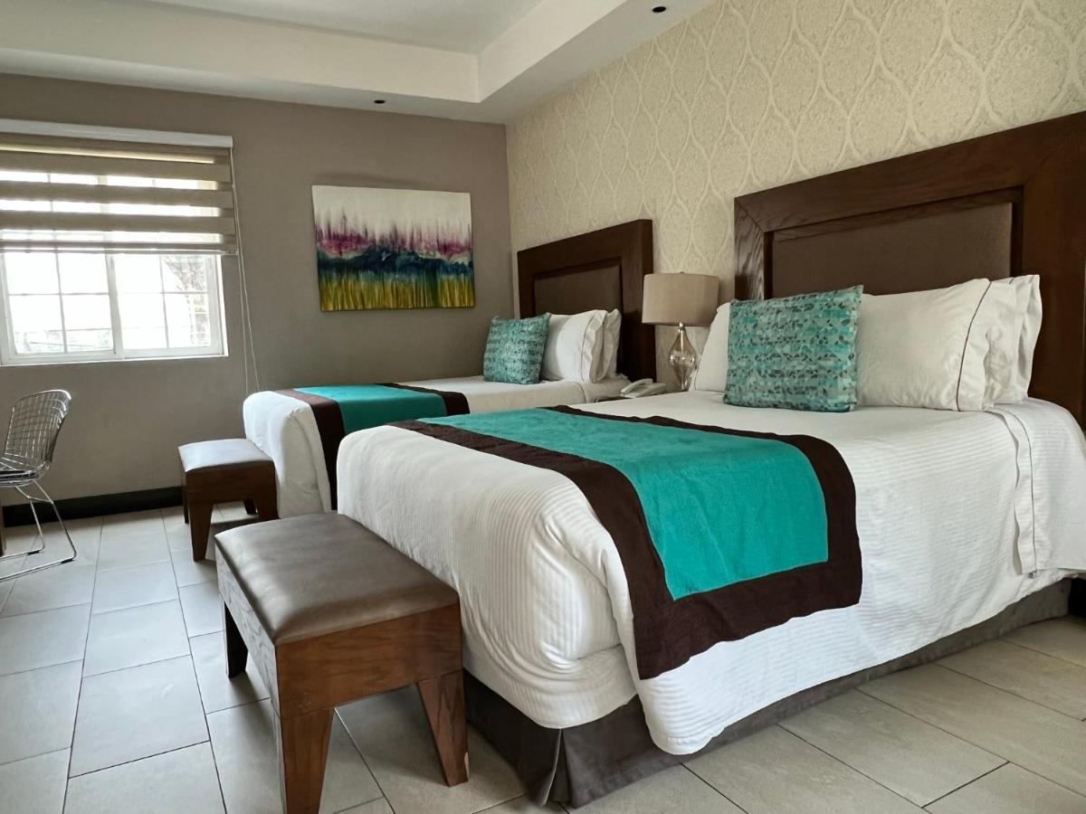 Aurea Hotel And Suites Zapopan Bagian luar foto