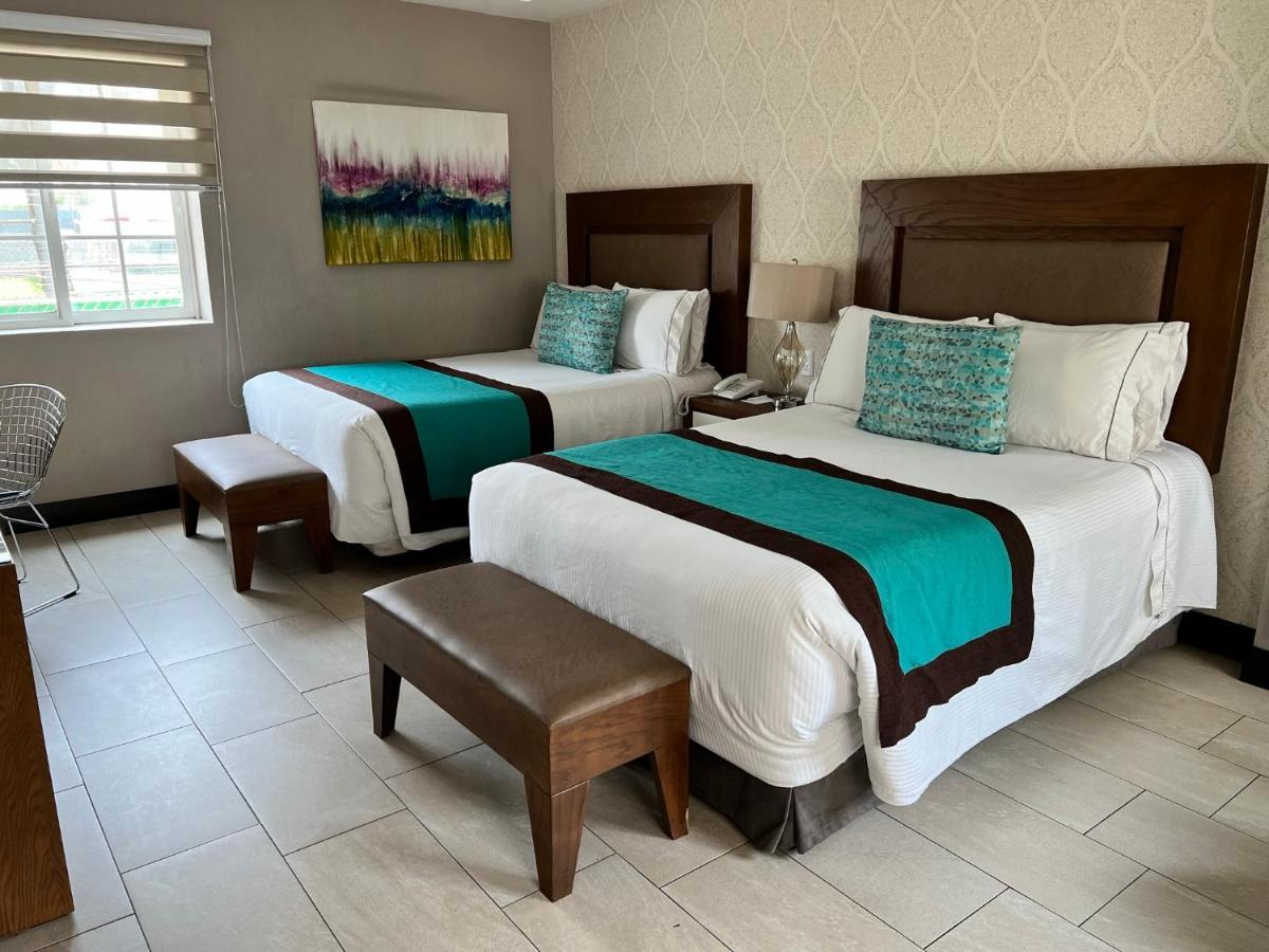 Aurea Hotel And Suites Zapopan Bagian luar foto