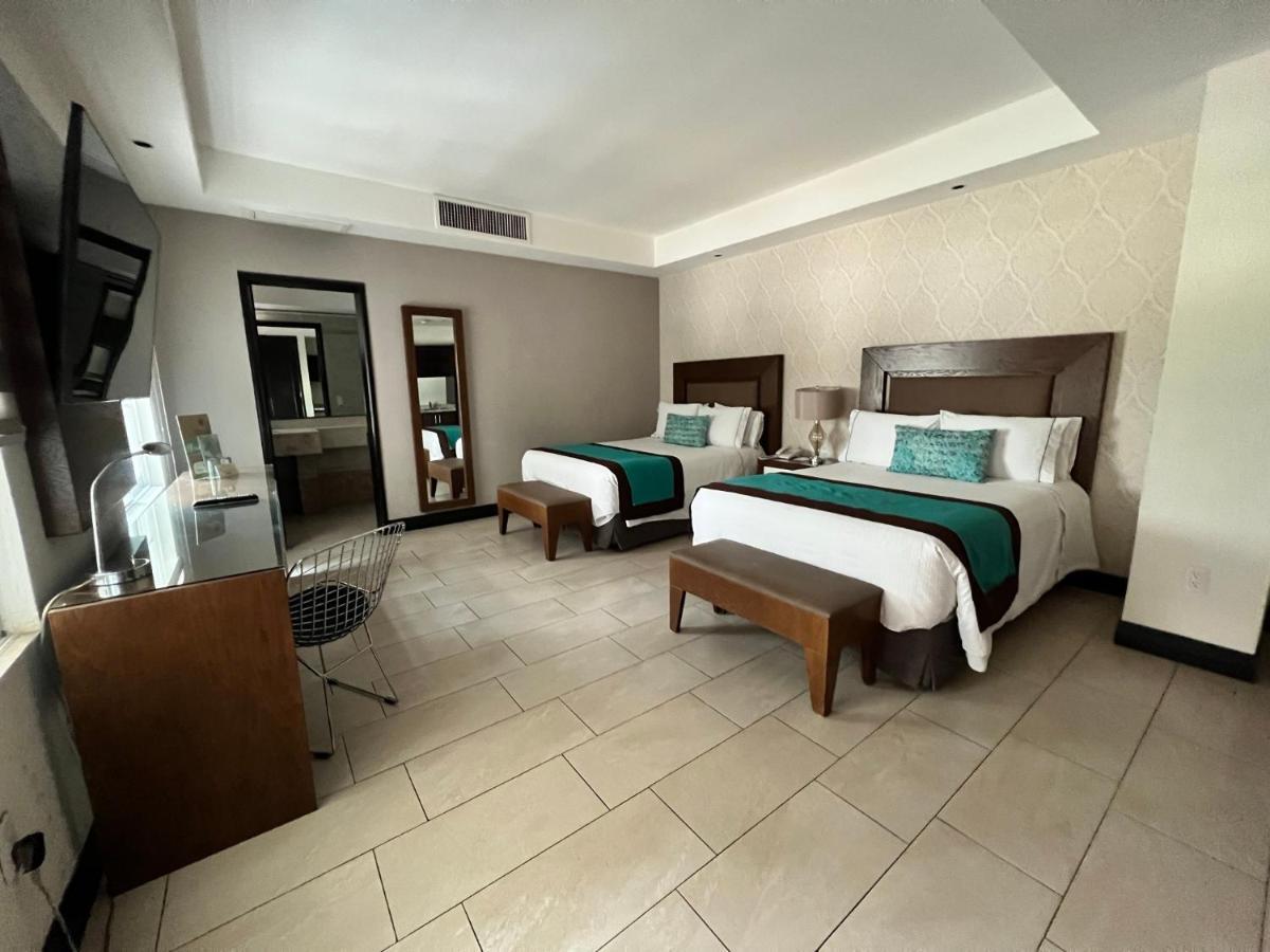 Aurea Hotel And Suites Zapopan Bagian luar foto
